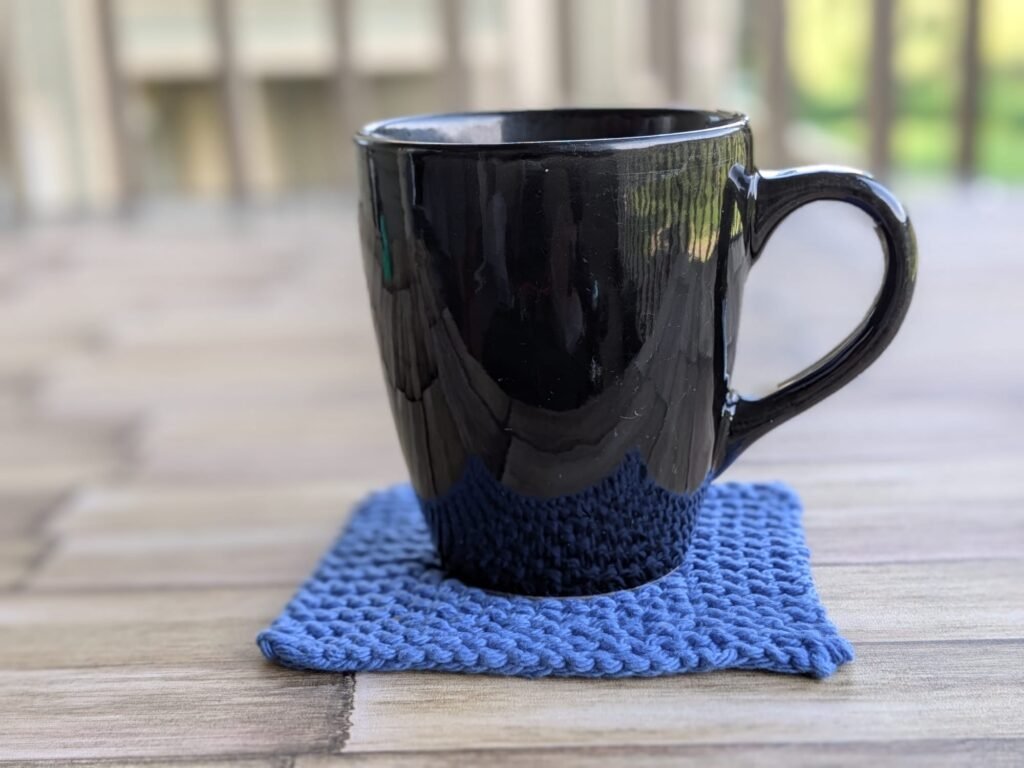 Everyday Comforts Diamond Coaster in use with a mug.